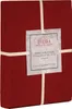 A red duvet cover is folded and tied with beige ribbon, with a product label attached. Produktbild-Vorschau
