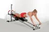 A woman is exercising on a Total Exerciser machine. Produktbild-Vorschau