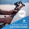Hands holding hiking poles with a blurred background of water and sky. Produktbild-Vorschau
