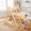 A child plays on a wooden climbing structure in a bedroom. Produktbild-Vorschau