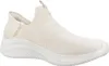 A single beige Skechers slip-on sneaker is shown from the side against a white background. Voir les images du produit