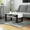 A modern living room scene with a coffee table in the foreground, a sofa in the background, and a rug on the floor. Produktbild-Vorschau