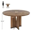 A diagram showing a round dining table with dimensions and a silhouette of a person for scale. Voir les images du produit