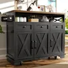A kitchen island with storage and a wine bottle on top, set in a home environment. Náhled obrázku produktu