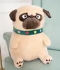 A plush pug dog toy sitting on a chair. Voir les images du produit
