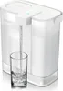 A white Philips water filter is shown dispensing water into a glass. Podgląd zdjęcia produktu