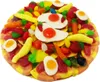 A close-up, overhead view of a gummy candy pizza. Produktbild-Vorschau