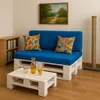 A living room scene with a pallet sofa and coffee table. Produktbild-Vorschau