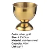 A golden egg cup on a white background with product specifications listed below. Produktbild-Vorschau