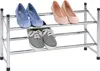 A two-tier shoe rack holding various shoes. Produktbild-Vorschau