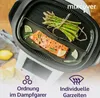 A steaming tray with salmon and asparagus on top of a kitchen appliance. Náhľad obrázku produktu