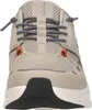 Front view of a beige athletic shoe. Voir les images du produit