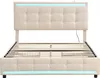 A beige upholstered bed frame with a tufted headboard and footboard, featuring blue LED lighting along the top of the headboard and the bottom of the footboard. The bed is shown without a mattress, revealing the wooden slat support system. Anteprima dell’immagine prodotto