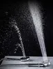 Two shower heads are shown with water spraying from them against a black background. Produktbild-Vorschau
