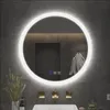 A round LED mirror mounted on a tiled wall above a sink. Náhled obrázku produktu
