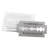 A stack of razor blades with one blade in the foreground. Produktbild-Vorschau