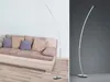 A split image showing a floor lamp next to a sofa on the left, and a close-up of the floor lamp on a gray background on the right. Náhled obrázku produktu
