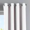Close-up of white curtains hanging from a rod. Produktbild-Vorschau