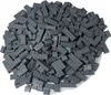 A pile of dark gray LEGO bricks on a white background. Náhled obrázku produktu