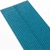 A teal acupressure mat with raised nubs is shown on a white background. Produktbild-Vorschau