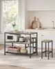 A kitchen island with storage and a stool, placed on a rug in a brightly lit kitchen. Náhled obrázku produktu