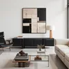 A modern living room with a TV cabinet, sofa, armchair, and coffee table. Produktbild-Vorschau