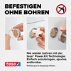 Demonstration of how to attach a tesa product without drilling, showing three steps of the process. Náhled obrázku produktu