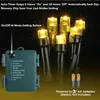 A close-up of battery-powered LED string lights with a control box and batteries. Produktbild-Vorschau