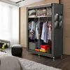 A portable fabric wardrobe with clothes hanging inside and items stored on shelves. Anteprima dell’immagine prodotto