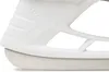 A close-up view of a white ice skate blade and part of the boot. Produktbild-Vorschau