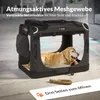 A dog is inside a portable dog crate with text overlays describing its features. Produktbild-Vorschau