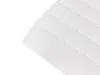 A close-up view of a white mattress topper with quilted wave patterns. Náhled obrázku produktu