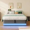 A modern bed with integrated LED lighting and charging stations, set in a bedroom with artwork on the wall. Produktbild-Vorschau