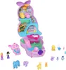 A Polly Pocket Mama and Joey Kangaroo Bag playset is displayed against a white background, with various accessories and miniature animal figures scattered around it. Podgląd zdjęcia produktu