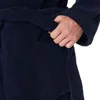 A close-up shot of a person's hand reaching into the pocket of a navy blue robe. Produktbild-Vorschau