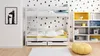 A white bunk bed with yellow accents in a child's room. Produktbild-Vorschau