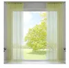 A window with light green string curtains, showing a sunny outdoor scene with a large tree. Produktbild-Vorschau