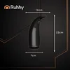 A black automatic soap dispenser is shown with dimensions indicated by lines and text. Anteprima dell’immagine prodotto