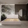A bedroom scene featuring a bed, nightstand, mirror, and decorative wallpaper. Náhled obrázku produktu
