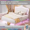 A white upholstered bed with LED lighting in a bedroom setting. Anteprima dell’immagine prodotto