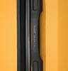 A close-up view of a black handle with the brand name 'WINGS' embossed on it, set against an orange background. Produktbild-Vorschau