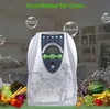 An ozone generator is shown in a kitchen setting with fruits and vegetables. Produktbild-Vorschau
