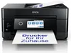 A black Epson printer is shown from the front, printing a document with German text. Náhled obrázku produktu