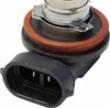 Close-up of a car headlight bulb base and connector. Anteprima dell’immagine prodotto