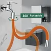 A bathroom sink area with a chrome faucet and an orange flexible hose extension. The hose is shown in multiple positions to demonstrate its flexibility. Náhľad obrázku produktu