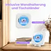 A white CD player is shown mounted on a wall and also placed on a table with books. Produktbild-Vorschau
