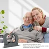 An elderly man wearing a neck speaker, with a younger woman behind him, both smiling. Produktbild-Vorschau