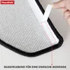 Close-up of a stair mat showing adhesive tape being applied to the underside for mounting. Produktbild-Vorschau