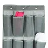 A close-up of a grey fabric hanging organizer with multiple pockets. Produktbild-Vorschau