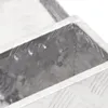 Close-up view of the corner of a silver aluminum storage box. Náhled obrázku produktu